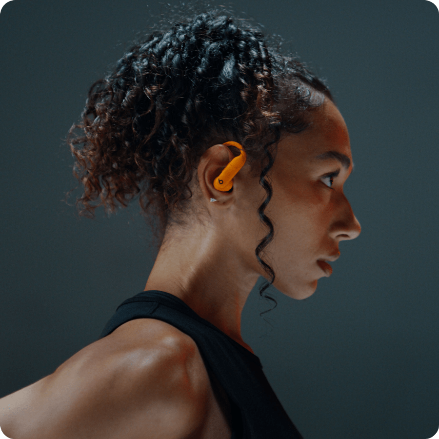 side view of female wearing Powerbeats Pro 2