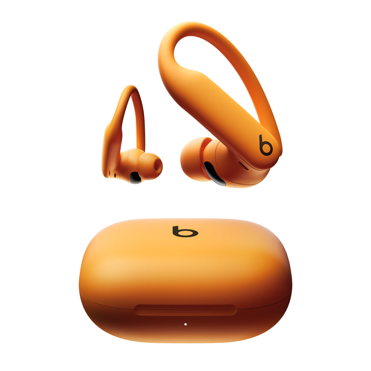 Close-up of Powerbeats Pro 2 in Electric Orange.